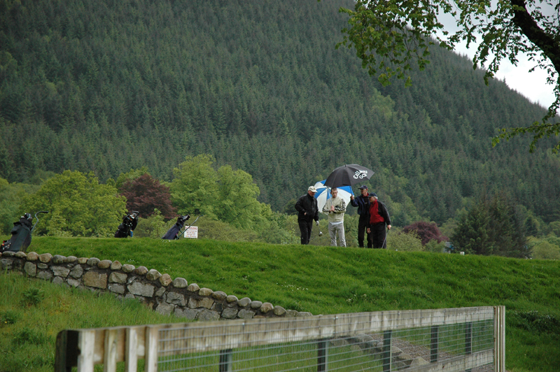 Playing golf in the rain Ballachulish, Lochaber, Highland  © 2006 Scotiana