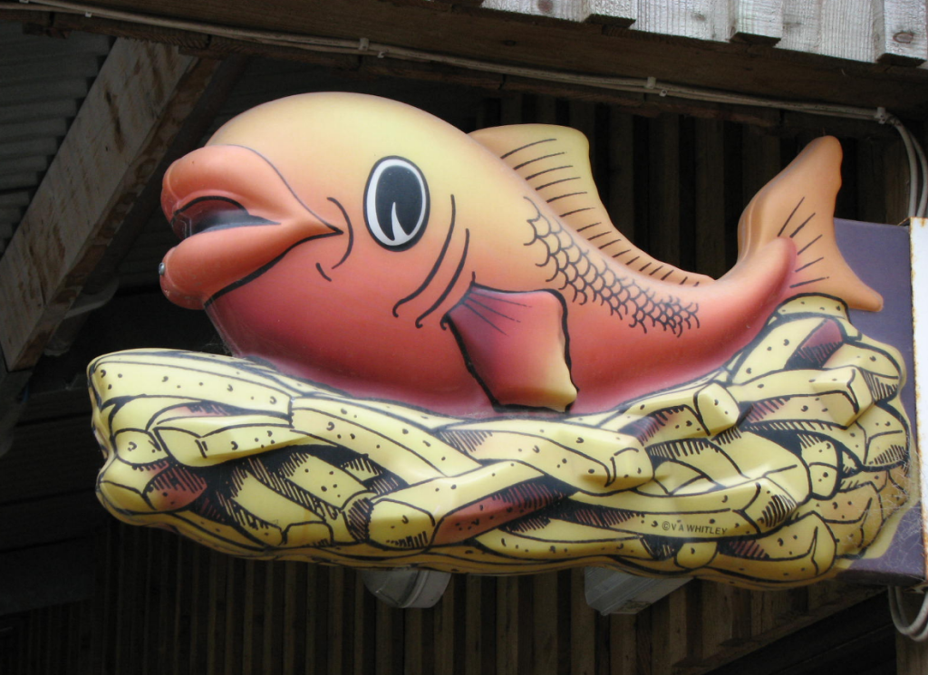 sign outside of scottish fish and chips restaurant