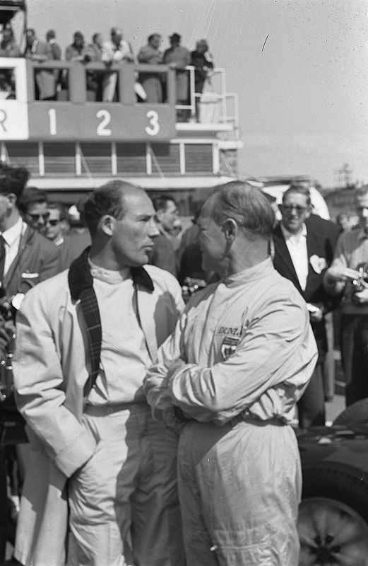 Stirling Moss (left) with Innes Ireland at the 1961 Dutch Grand Prix