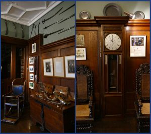 Thirlestane Castle The Entrance Hall - grandfather clock and arms © 2019 Scotiana